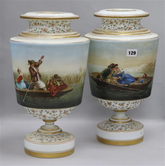 A pair of Victorian hand painted glass vases